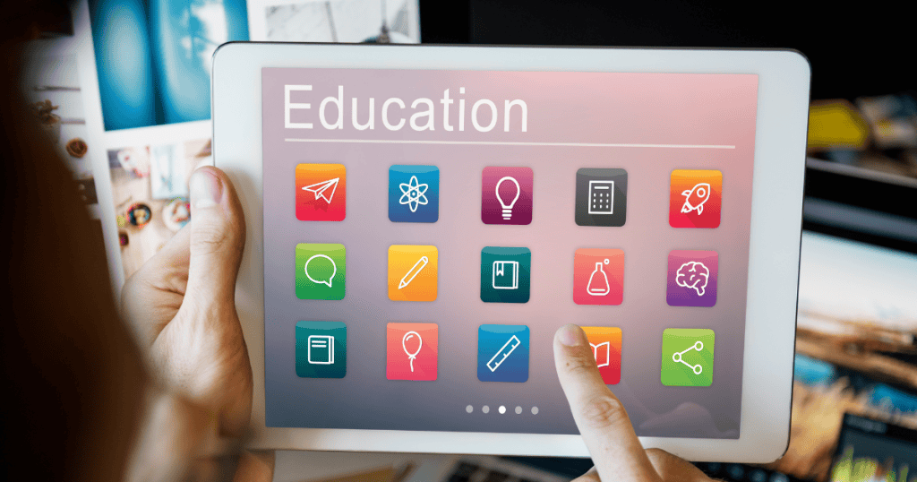 A hand interacts with a tablet screen filled with academic icons, presenting a versatile interface tailored for interactive learning and knowledge sharing.