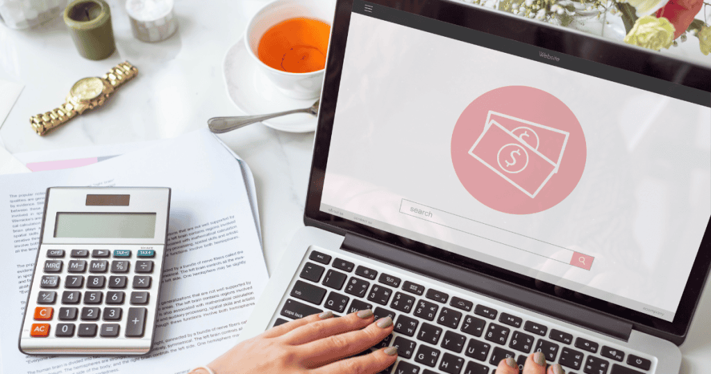 A person typing on a laptop showing a currency icon next to a calculator and paperwork, capturing the transition from casual browsing to formal commercial management.